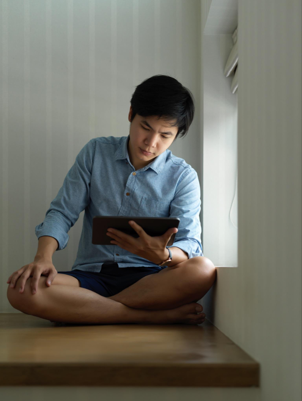 Trade professional reviewing bookings on a tablet